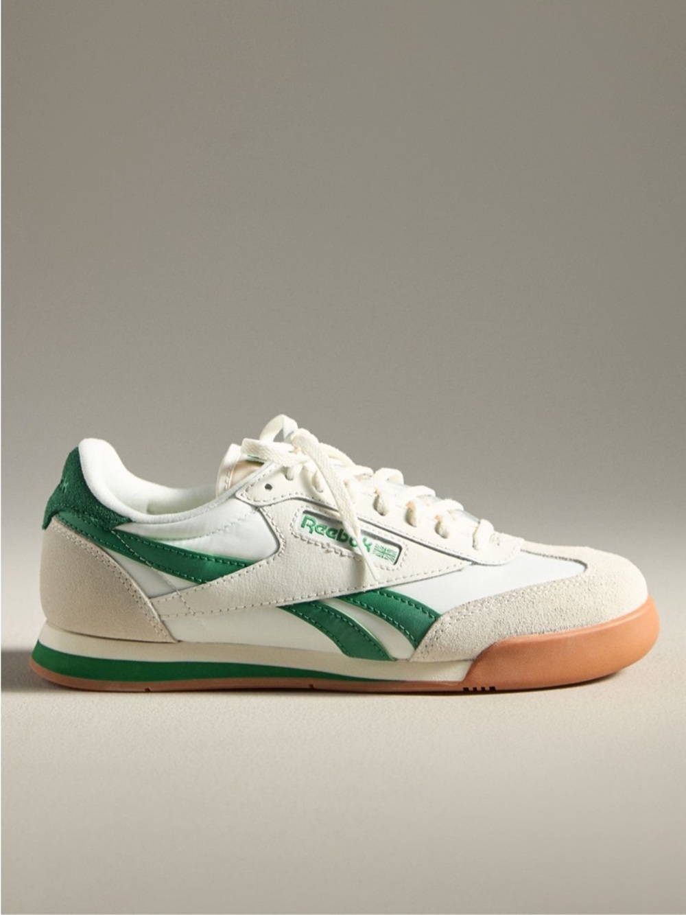 Reebok Men’s White Leather Sneaker with Green Accents and Gum Sole